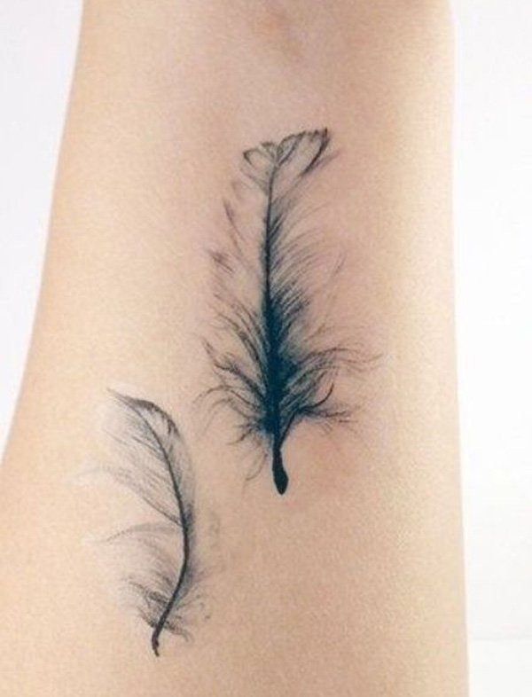Semiplume bird tattoo Tattoo on skin