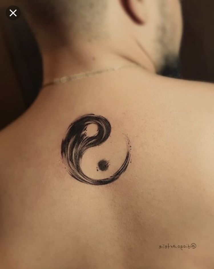 Minimalist Brushstroke Black and White Yin-Yang Tattoo Tattoo on skin