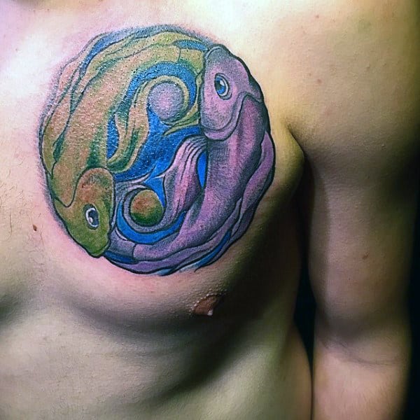 Purple and Green Fish Yin-Yang Tattoo Tattoo on skin