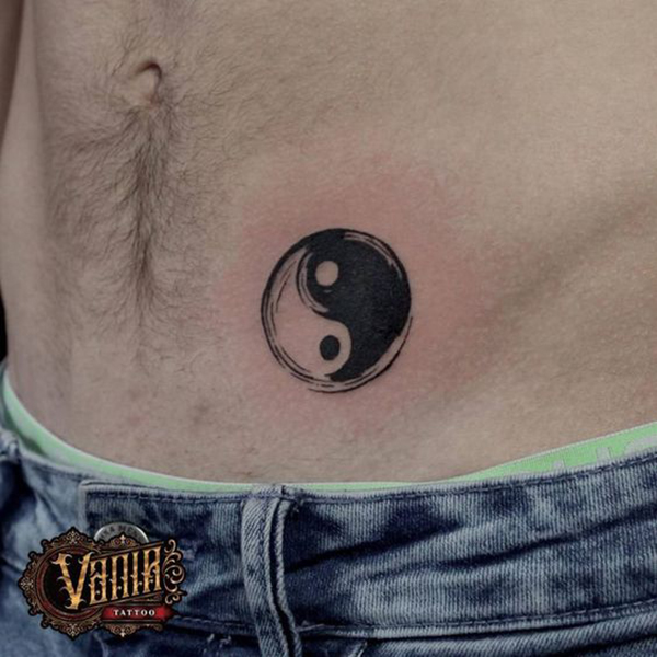Simple Blackwork Yin-Yang Sketch Tattoo Tattoo on skin